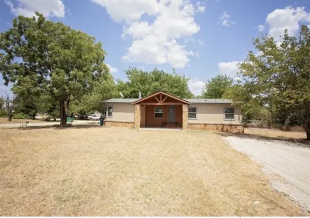 Photo 2 of Manufactured home for sale at 128 Burkhalter St, Graford, TX 76449 | MLS# 21398684 | Listing updated on 2026-10-01