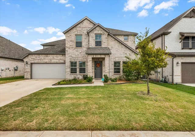 Photo 2 of Single family home for sale at 305 Laurel Dr, Justin, TX 76247 | MLS# 21381378 | Listing updated on 2026-10-08