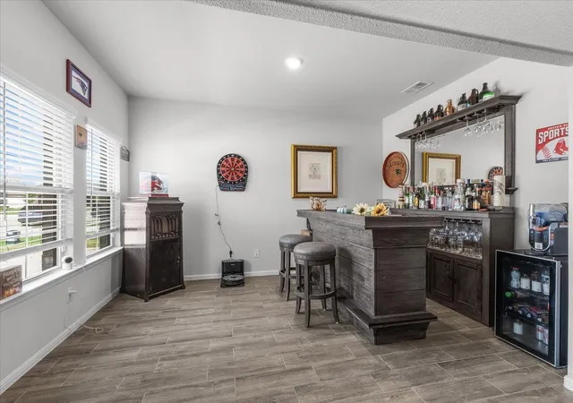 Photo 3 of Single family home for sale at 305 Laurel Dr, Justin, TX 76247 | MLS# 21381378 | Listing updated on 2026-10-08