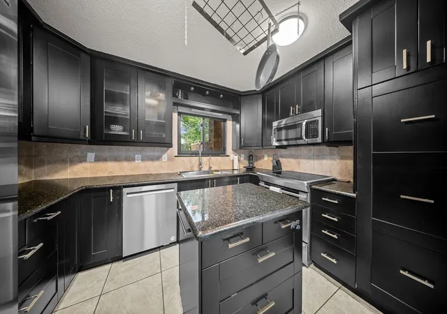 Photo 2 of Townhouse for sale at 9302 Chimney Sweep Ln, Dallas, TX 75243 | MLS# 21386278 | Listing updated on 2026-10-01