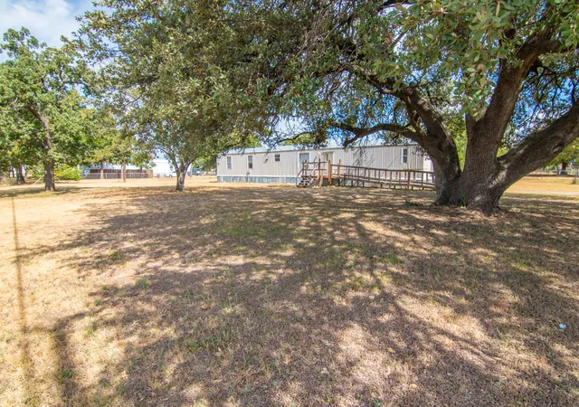 Photo 1 of Manufactured home for sale at 102 Live Oak Rd, Early, TX 76802 | MLS# 21400851 | Listing updated on 2026-10-09