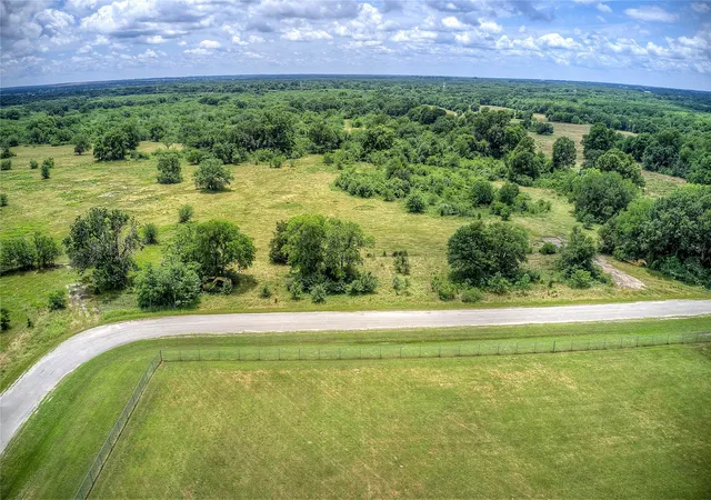Photo 2 of Land for sale at Tbd Washington St, Commerce, TX 75428 | MLS# 21378736 | Listing updated on 2026-10-02