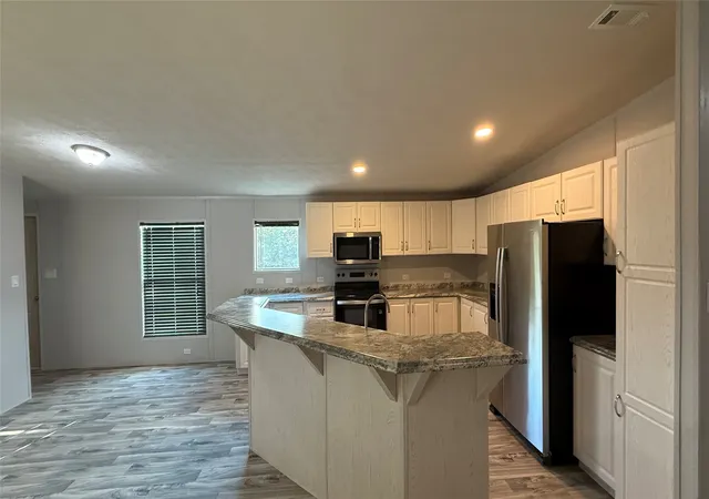 Photo 3 of Manufactured home for sale at 144 Wheelis Loop, Decatur, TX 76234 | MLS# 21401055 | Listing updated on 2026-10-02