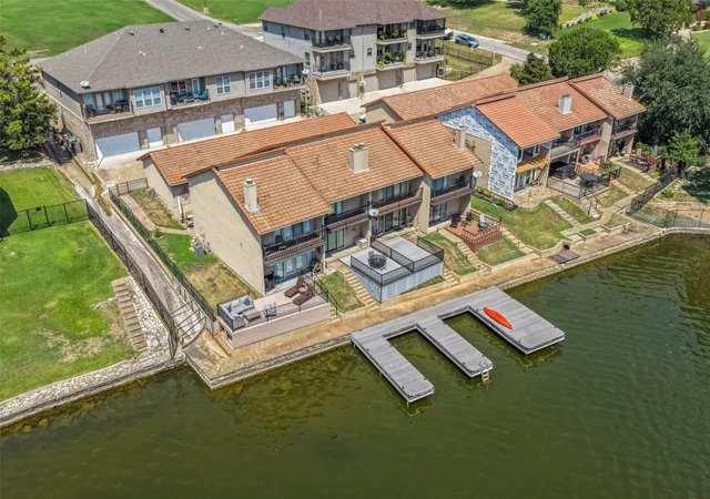 Photo 1 of Townhouse for sale at 5515 Club Cvs Ct, Granbury, TX 76049 | MLS# 21401550 | Listing updated on 2026-10-10