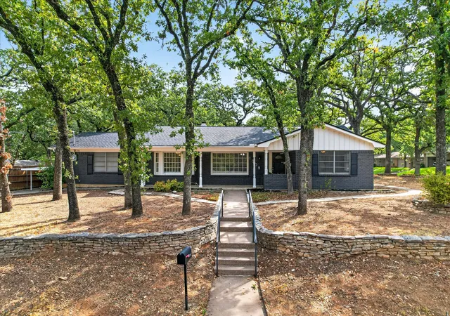 Photo 1 of Single family home for sale at 1708 Cimarron Trl, Hurst, TX 76054 | MLS# 21401708 | Listing updated on 2026-10-03