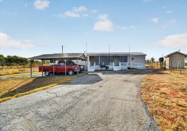 Photo 2 of Manufactured home for sale at 5703 N Sunchase Dr, Granbury, TX 76049 | MLS# 21401713 | Listing updated on 2026-10-02