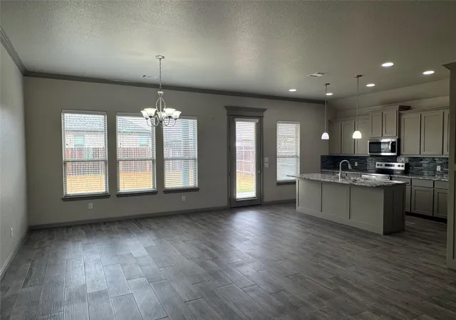 Photo 2 of Single family home for sale at 3205 Windcrest Dr, Granbury, TX 76049 | MLS# 21402501 | Listing updated on 2026-10-09