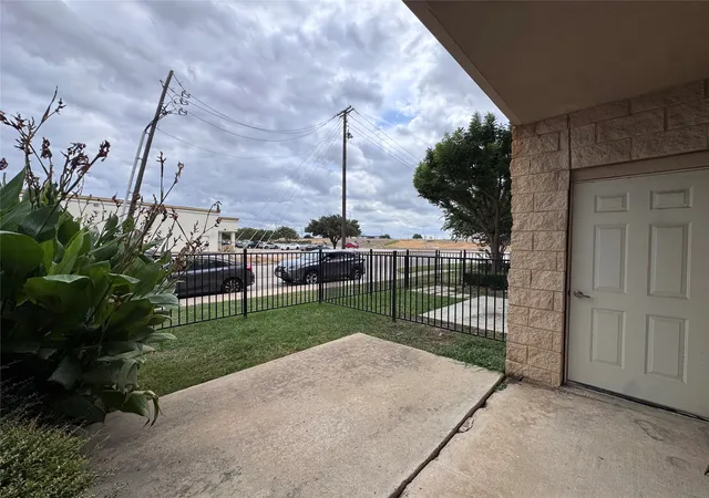 Listing Photo 1 - Condo for sale in building located at 1100 W Trinity Mills Rd, Carrollton, TX 75006 - Unit #1015