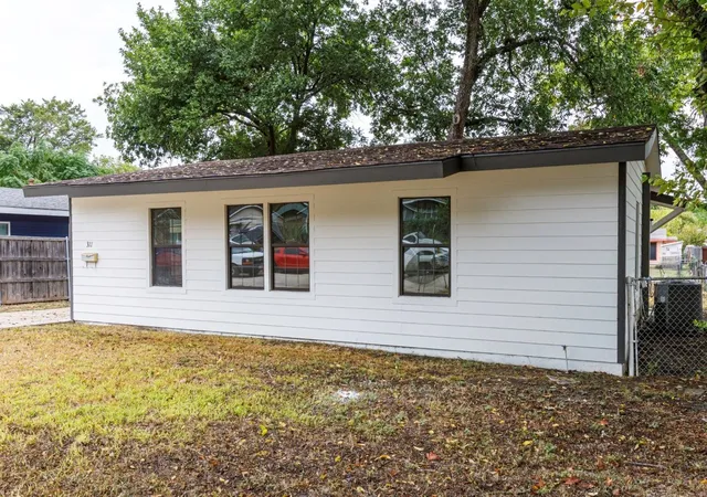 Photo 2 of Single family home for sale at 311 Glenfield Dr, Garland, TX 75040 | MLS# 21403506 | Listing updated on 2026-10-09