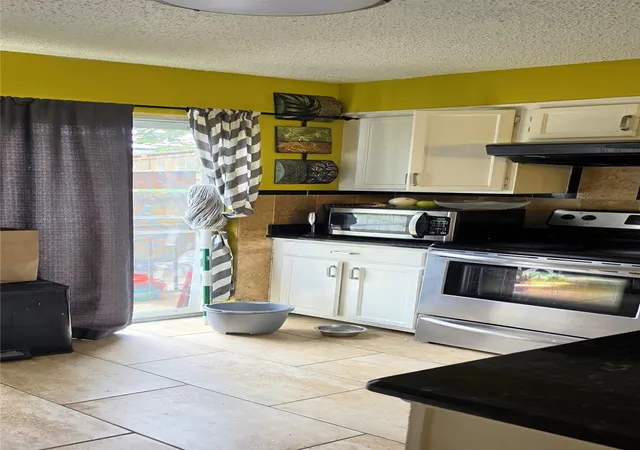 Listing Photo 3 - Condo for sale in building located at 3620 Parkridge Dr, Dallas, TX 75234 - Unit #111