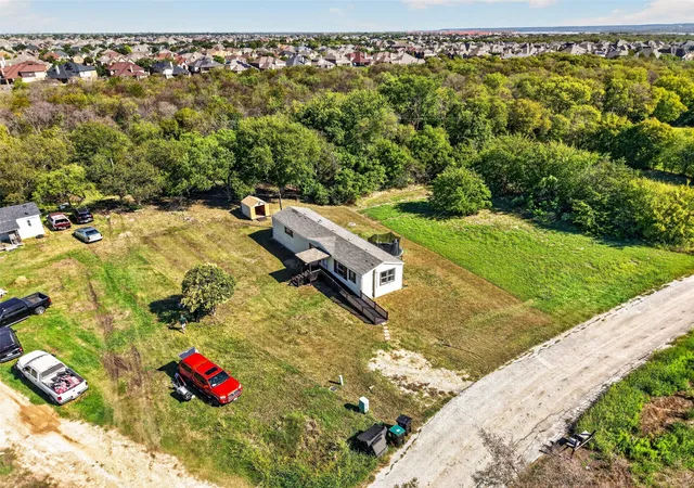 Photo 1 of Manufactured home for sale at 24 Spring Crk Cir, Grand Prairie, TX 75054 | MLS# 21402236 | Listing updated on 2026-10-08