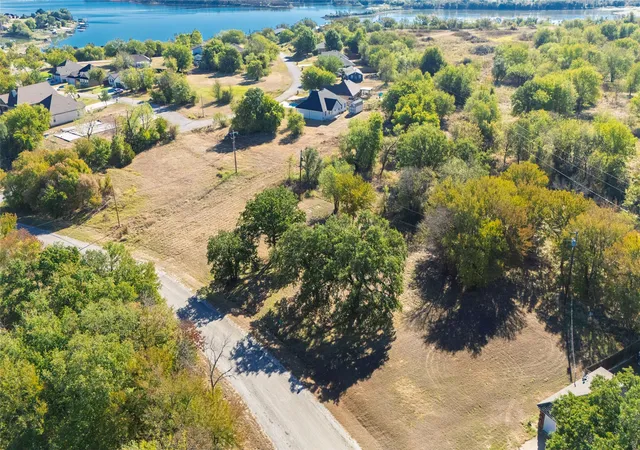 Photo 3 of Land for sale at Tbd Lot 21 Port O Call Dr, Runaway Bay, TX 76426 | MLS# 21404538 | Listing updated on 2026-10-08