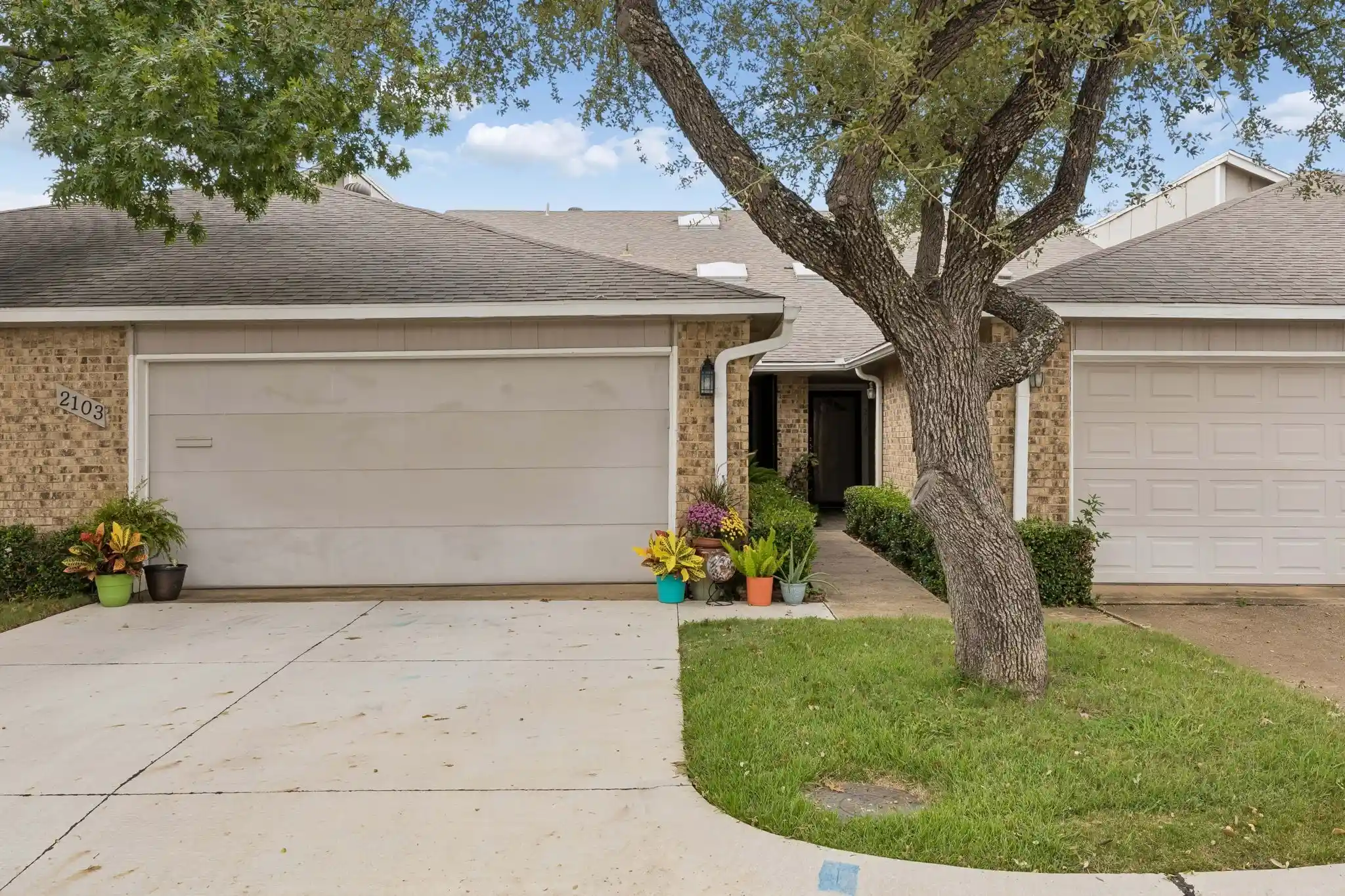 Photo 1 of Townhouse for sale at 2103 Country Villa Dr, Carrollton, TX 75006 | MLS# 21412656 | Listing updated on 2026-10-23