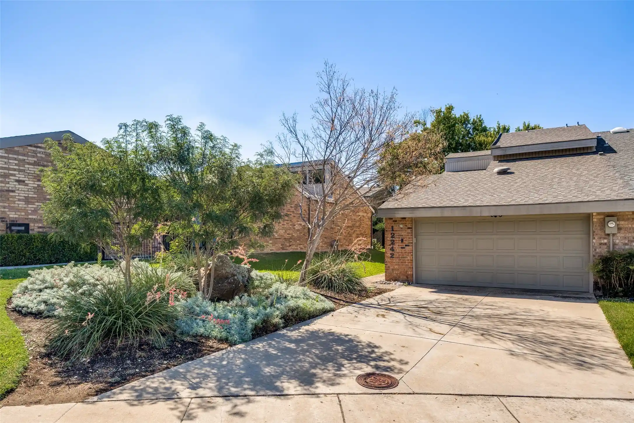 Photo 1 of Townhouse for sale at 12242 Montego Plz, Dallas, TX 75230 | MLS# 21410429 | Listing updated on 2026-10-26