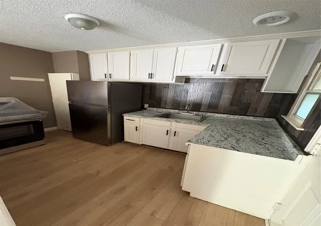 Photo 2 of Single family home for sale at 1223 Small St, Grand Prairie, TX 75050 | MLS# 21421359 | Listing updated on 2026-10-30