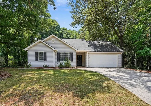 1st image of 560 E Country Woods Dr, Covington, GA 30016 | MLS# 7805689
