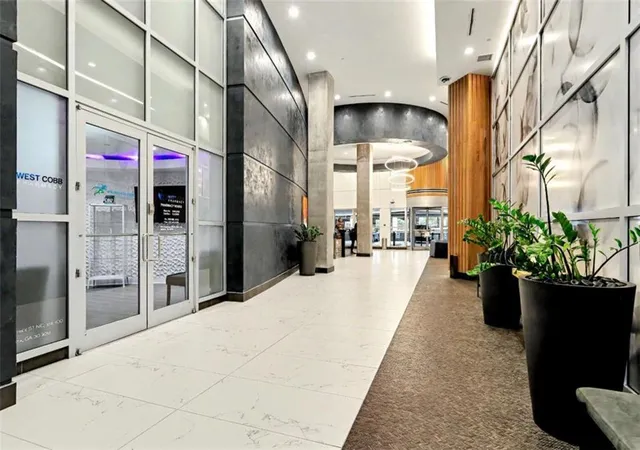 Listing Photo 1 - Condo for sale in building located at 943 Peachtree St, Atlanta, GA 30309 - Unit #1411
