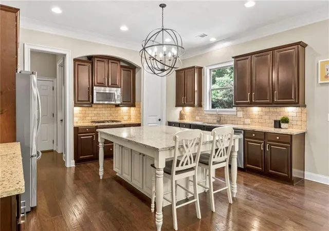 Photo 3 of Single family home for sale at 12460 Pindell Cir, Alpharetta, GA 30004 | MLS# 7778429 | Listing updated on 2026-09-12
