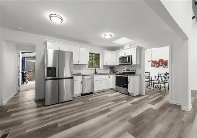 Photo 3 of Single family home for sale at 3145 Flat Shls Rd, Atlanta, GA 30349 | MLS# 7819802 | Listing updated on 2026-08-13