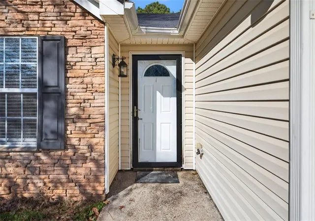 Photo 2 of Sale Pending at 1411 Elliotts Ln, Auburn, GA 30011 | MLS# 7738588 | Listing updated on 2026-08-26