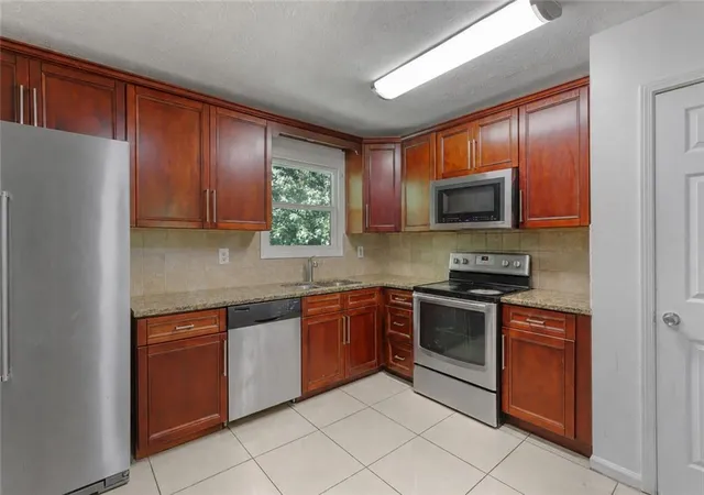 Photo 2 of Single family home for sale at 1563 Greenwood Dr, Norcross, GA 30093 | MLS# 7828886 | Listing updated on 2026-08-29