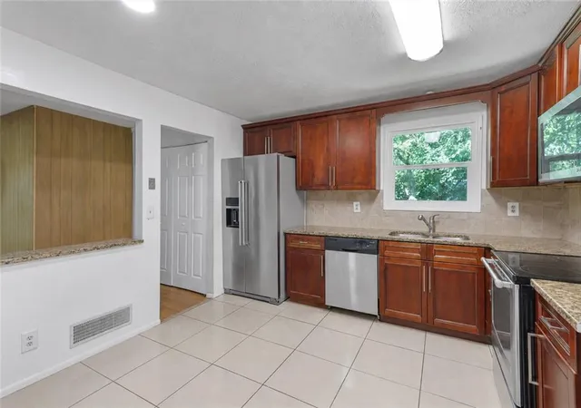 Photo 3 of Single family home for sale at 1563 Greenwood Dr, Norcross, GA 30093 | MLS# 7828886 | Listing updated on 2026-08-29