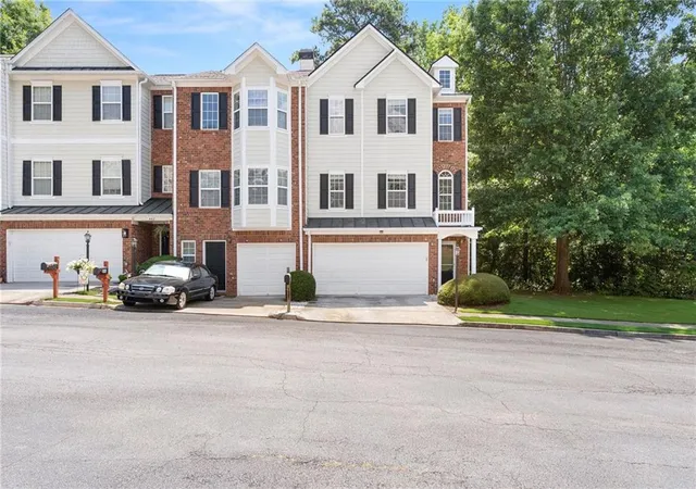Photo 1 of Townhouse for sale at 446 Sandtrap Ln, Sugar Hill, GA 30518 | MLS# 7824429 | Listing updated on 2026-08-21