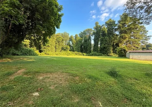 Photo 13 of Single family home for sale at 142 Hutton Pl Nw, Atlanta, GA 30318 | MLS# 7819132 | Listing updated on 2026-08-13