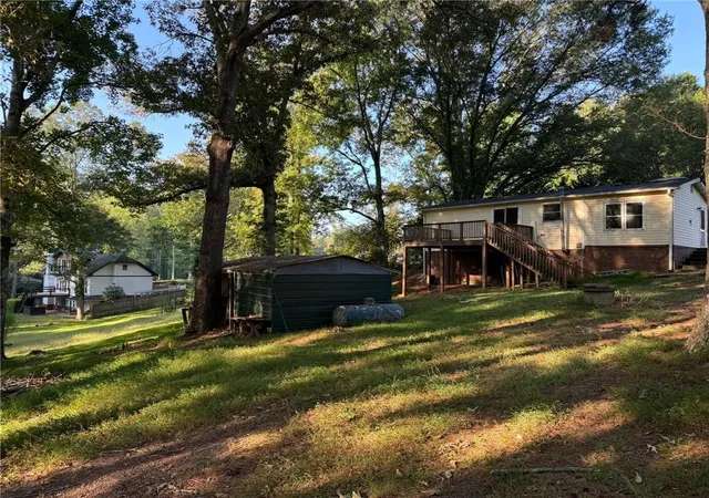 Photo 2 of Single family home for sale at 14450 Cogburn Rd, Alpharetta, GA 30004 | MLS# 7790294 | Listing updated on 2026-08-13