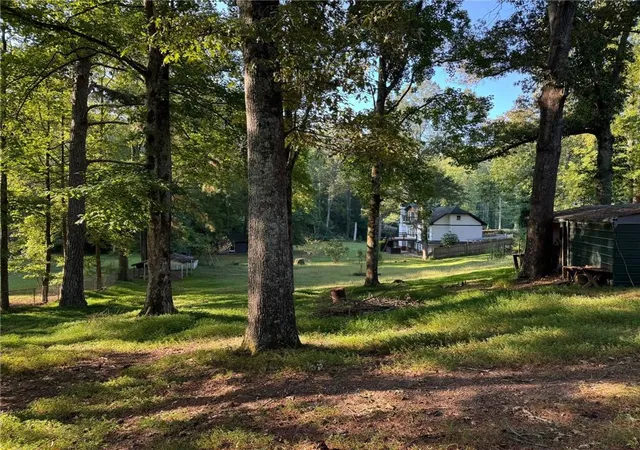 Photo 3 of Single family home for sale at 14450 Cogburn Rd, Alpharetta, GA 30004 | MLS# 7790294 | Listing updated on 2026-08-13