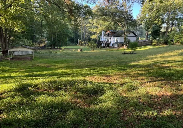 Photo 4 of Single family home for sale at 14450 Cogburn Rd, Alpharetta, GA 30004 | MLS# 7790294 | Listing updated on 2026-08-13