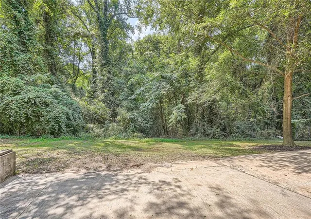 Photo 24 of Single family home for sale at 895 Kings Grant Dr Nw, Atlanta, GA 30318 | MLS# 7821394 | Listing updated on 2026-09-11