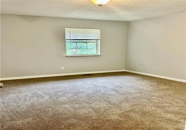 Photo 4 of Sale Pending at 1984 Cheatham Woods Dr SW, Marietta, GA 30008 | MLS# 7813858 | Listing updated on 2026-10-08
