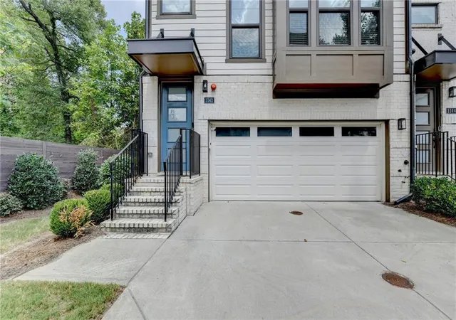Photo 1 of Townhouse for sale at 1142 Ansel Ln Nw, Atlanta, GA 30318 | MLS# 7856327 | Listing updated on 2026-10-20