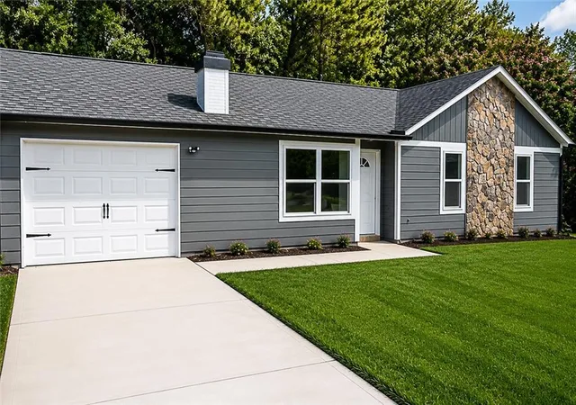Photo 3 of Sale Pending at 1818 Petite Ln, Lithonia, GA 30058 | MLS# 7787624 | Listing updated on 2026-09-17