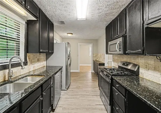 Photo 2 of Single family home for sale at 415 Grist Ml Dr E, Acworth, GA 30101 | MLS# 7810451 | Listing updated on 2026-09-10