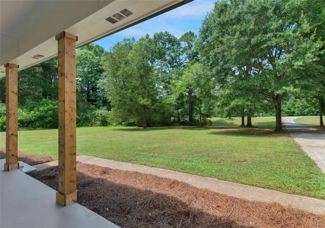 Photo 3 of Sale Pending at 976 Hampton Locust Grv Rd, Hampton, GA 30228 | MLS# 7818742 | Listing updated on 2026-09-16
