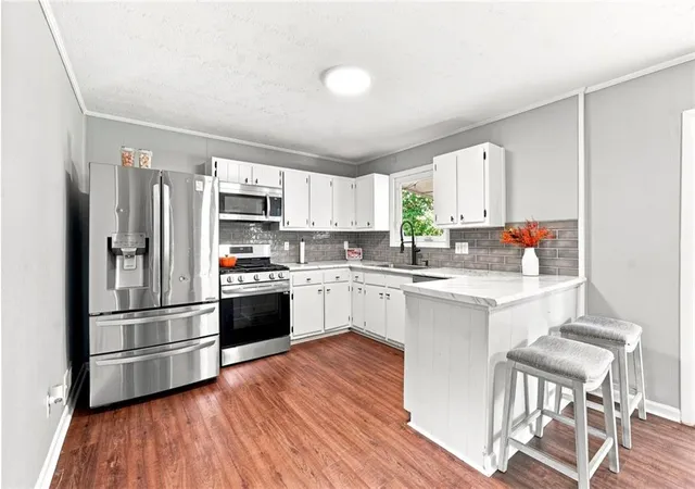 Photo 3 of Single family home for sale at 624 Village Ln Dr Sw, Marietta, GA 30060 | MLS# 7824665 | Listing updated on 2026-09-12