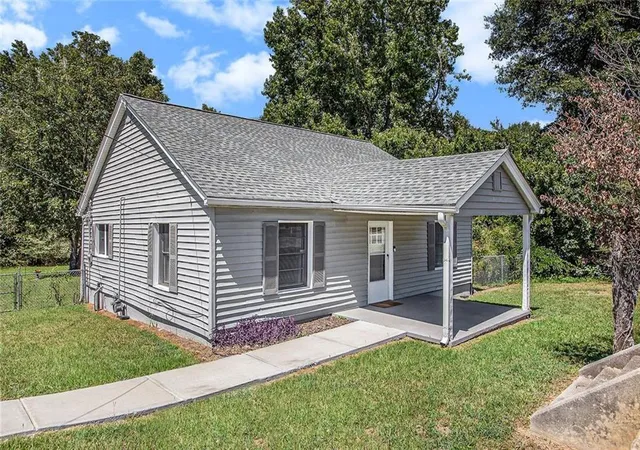 Photo 2 of Single family home for sale at 1298 Irwin Brg Rd Nw, Conyers, GA 30012 | MLS# 7700776 | Listing updated on 2026-08-27