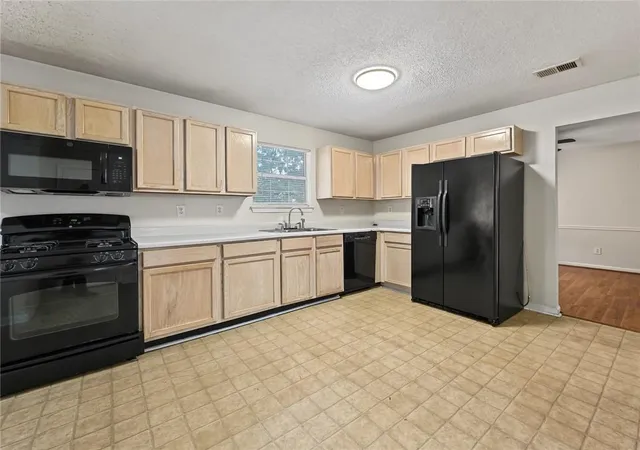 Photo 4 of Single family home for sale at 2416 Rambling Wy, Lithonia, GA 30058 | MLS# 7827282 | Listing updated on 2026-09-19