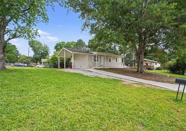 Photo 2 of Single family home for sale at 1394 Almand Crk Dr Sw, Conyers, GA 30094 | MLS# 7789358 | Listing updated on 2026-08-21