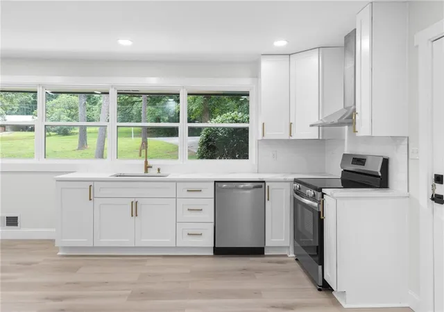 Photo 3 of Sale Pending at 293 Harmony Grv Rd, Lilburn, GA 30047 | MLS# 7805755 | Listing updated on 2026-09-15