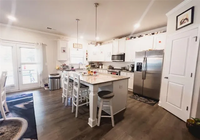 Photo 4 of Single family home for sale at 295 Stonecreek Pkwy, Covington, GA 30016 | MLS# 7830361 | Listing updated on 2026-09-03