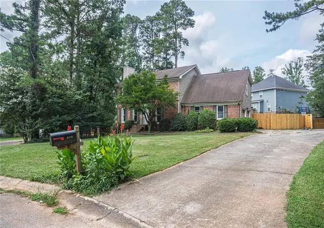 Photo 3 of Single family home for sale at 3170 Pine Cvs Ct SW, Lilburn, GA 30047 | MLS# 7806096 | Listing updated on 2026-08-24