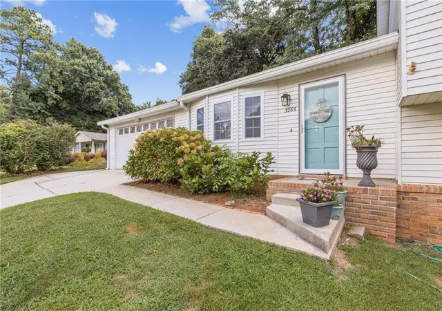 Photo 2 of Single family home for sale at 3266 Alcazar Dr Sw, Lilburn, GA 30047 | MLS# 7818889 | Listing updated on 2026-08-11