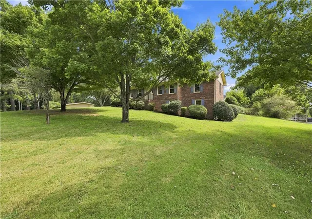 Photo 2 of Single family home for sale at 208 Woodland Cir Se, Calhoun, GA 30701 | MLS# 7828400 | Listing updated on 2026-09-18