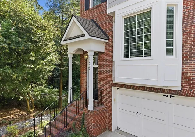 Photo 1 of Townhouse for sale at 1262 Brickton Dr NW, Atlanta, GA 30318 | MLS# 7820994 | Listing updated on 2026-10-29