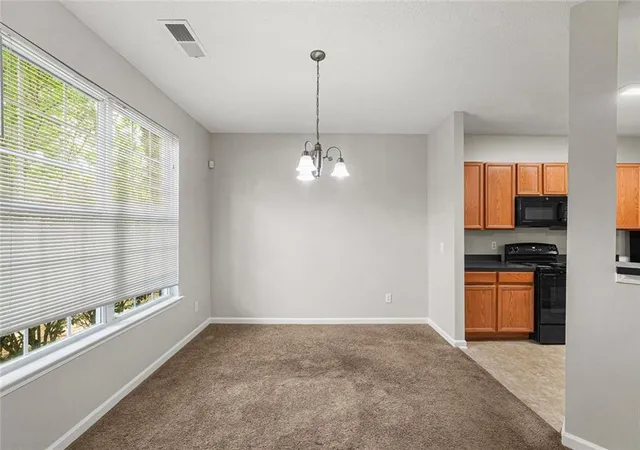 Photo 4 of Townhouse for sale at 1618 Bayrose Cir, Atlanta, GA 30344 | MLS# 7799067 | Listing updated on 2026-09-14