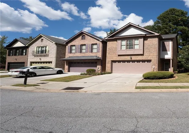 Photo 1 of Townhouse for sale at 1665 Oakbrook Lake Dr, Norcross, GA 30093 | MLS# 7826889 | Listing updated on 2026-08-28