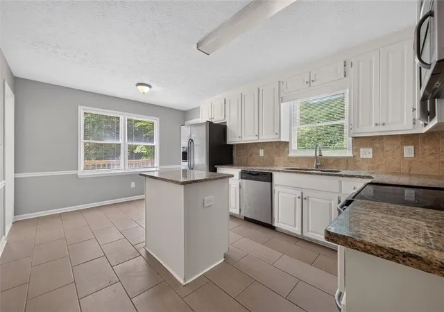 Photo 3 of Sale Pending at 1675 Longwood Dr SW, Marietta, GA 30008 | MLS# 7785242 | Listing updated on 2026-09-22
